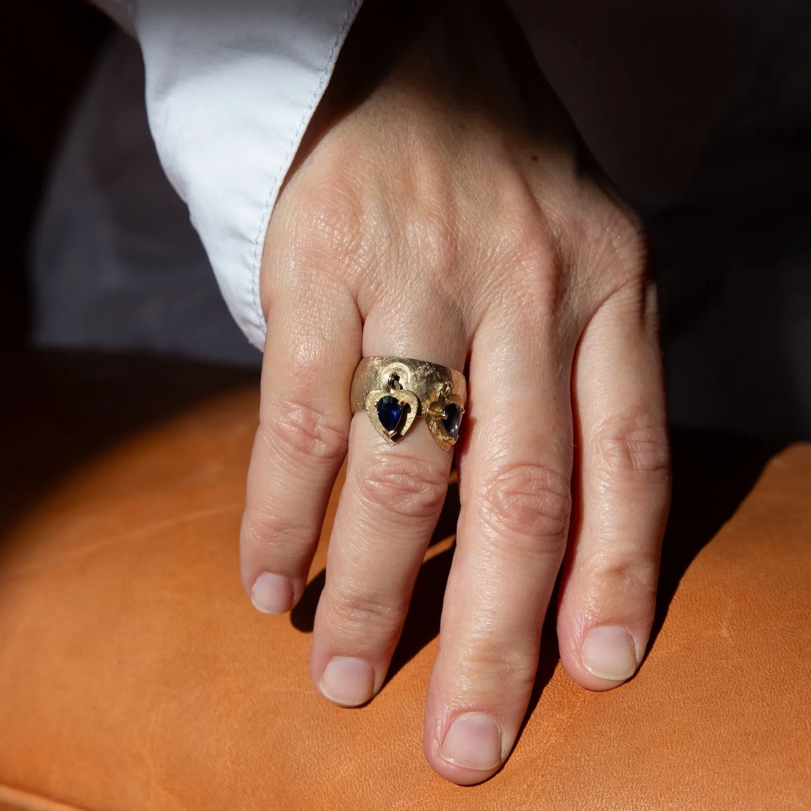 14k Brushed Gold Cigar Band with Dangling Sapphire Hearts