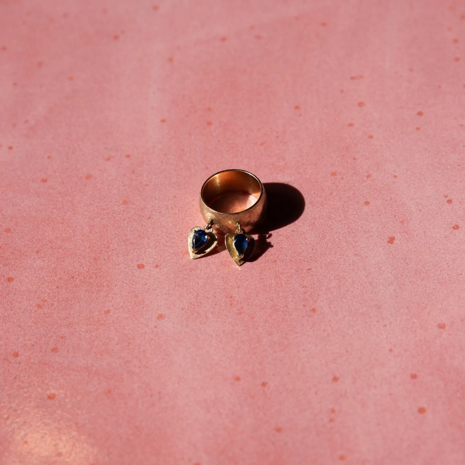 14k Brushed Gold Cigar Band with Dangling Sapphire Hearts