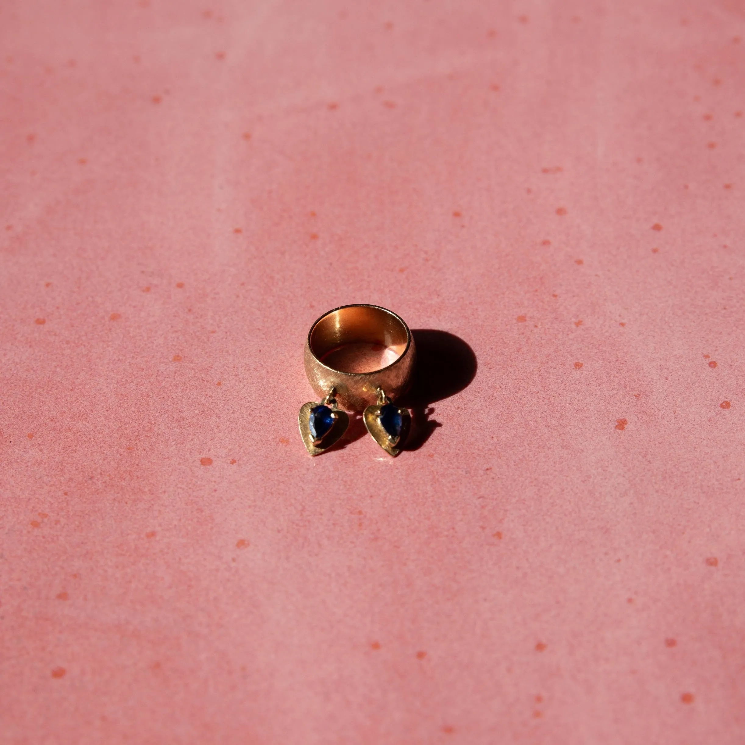 14k Brushed Gold Cigar Band with Dangling Sapphire Hearts