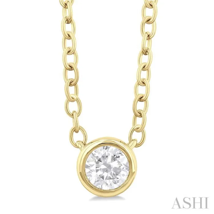 1/6 ctw Petite Bezel Set Round Cut Diamond Fashion Pendant With Chain in 10K Yellow Gold