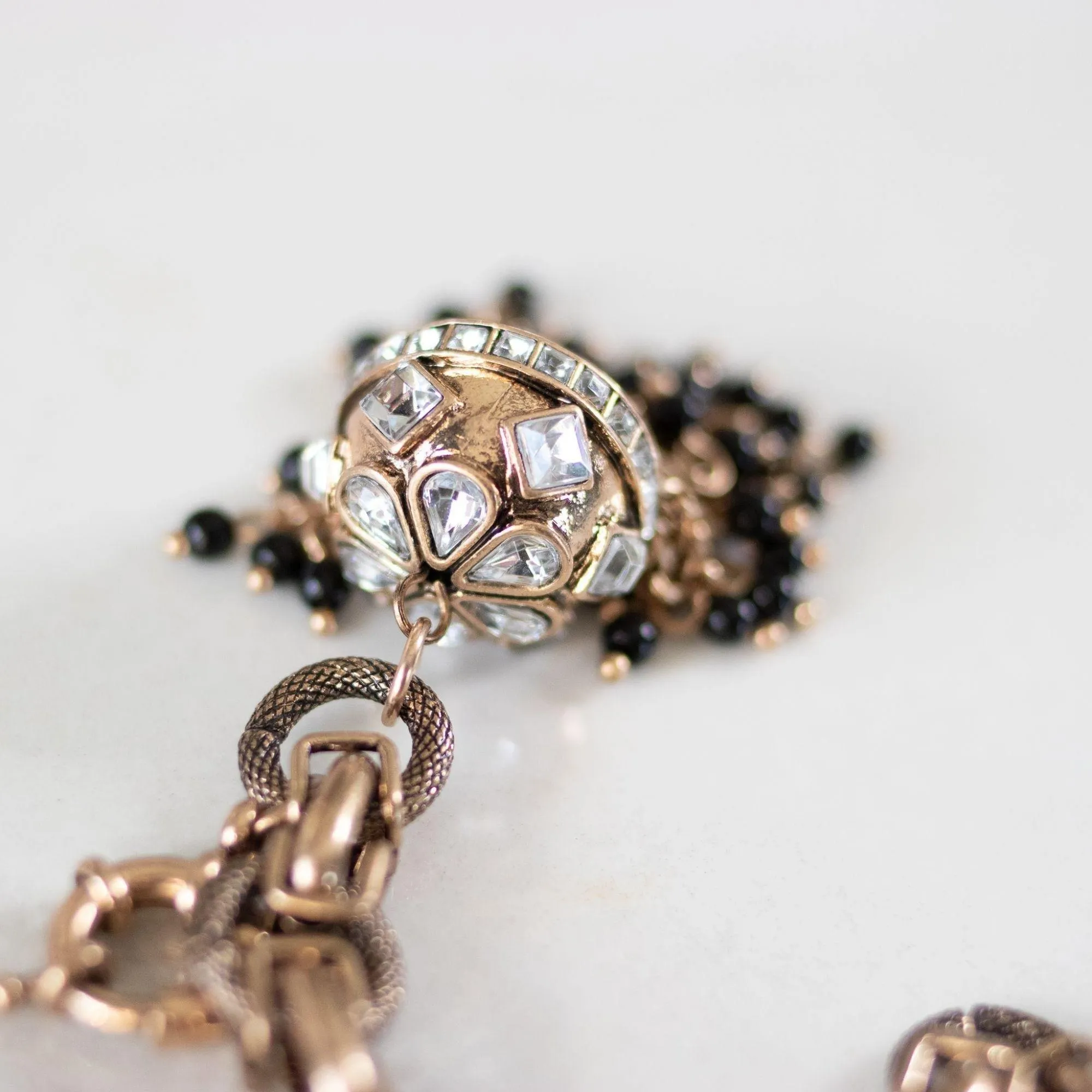 Chunky Brass Gilt Chain Bracelet with Diamante Rhinestone Domed Cap with Chain and Black Bead Tassels