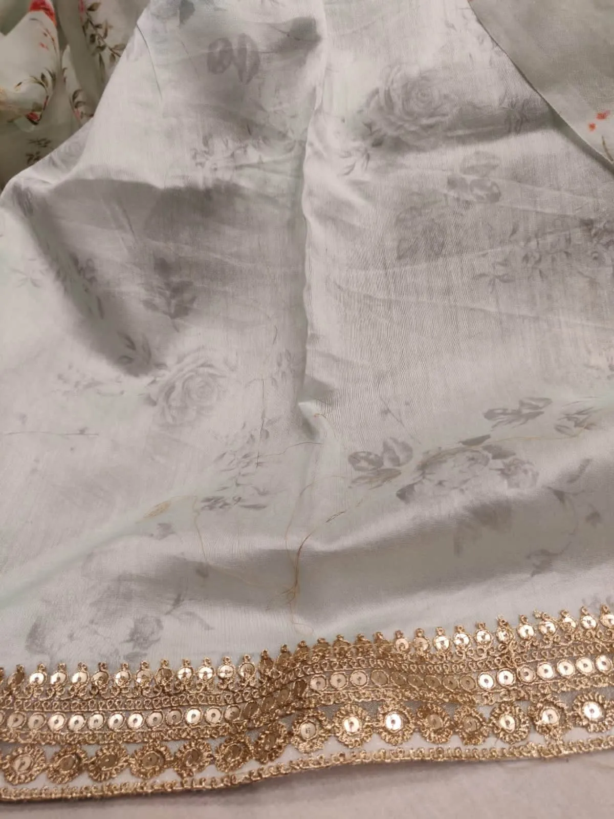 Floral printed Anushka Sharma Georgette Saree with embellished  Sequins Lace Border