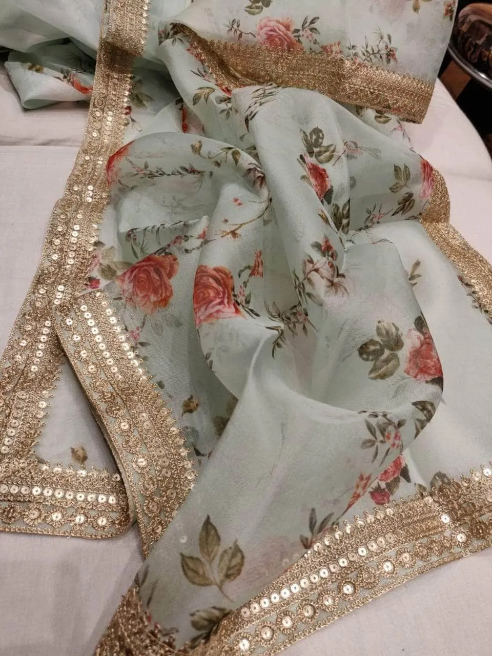Floral printed Anushka Sharma Georgette Saree with embellished  Sequins Lace Border