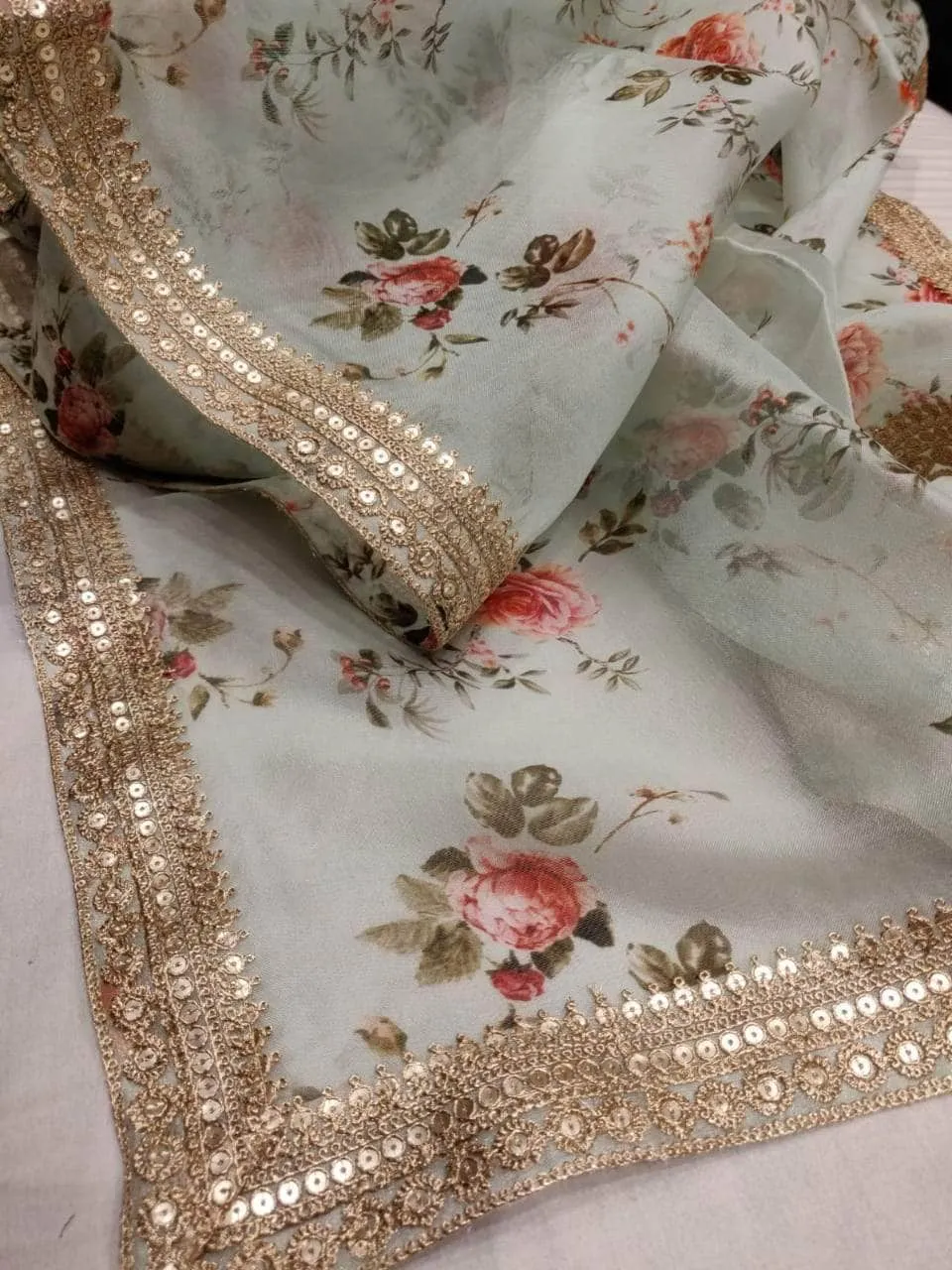 Floral printed Anushka Sharma Georgette Saree with embellished  Sequins Lace Border
