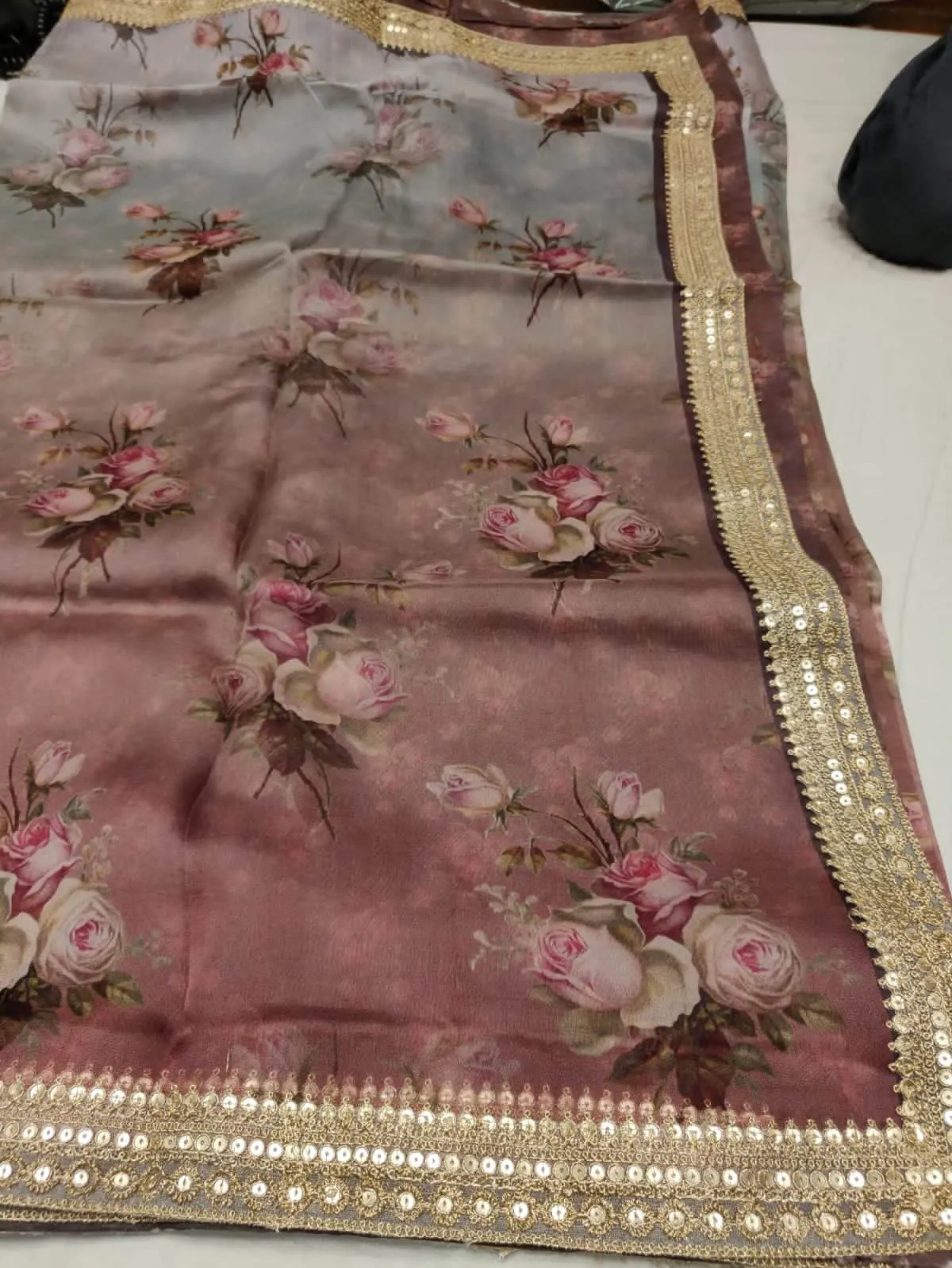 Floral printed Anushka Sharma Georgette Saree with embellished  Sequins Lace Border