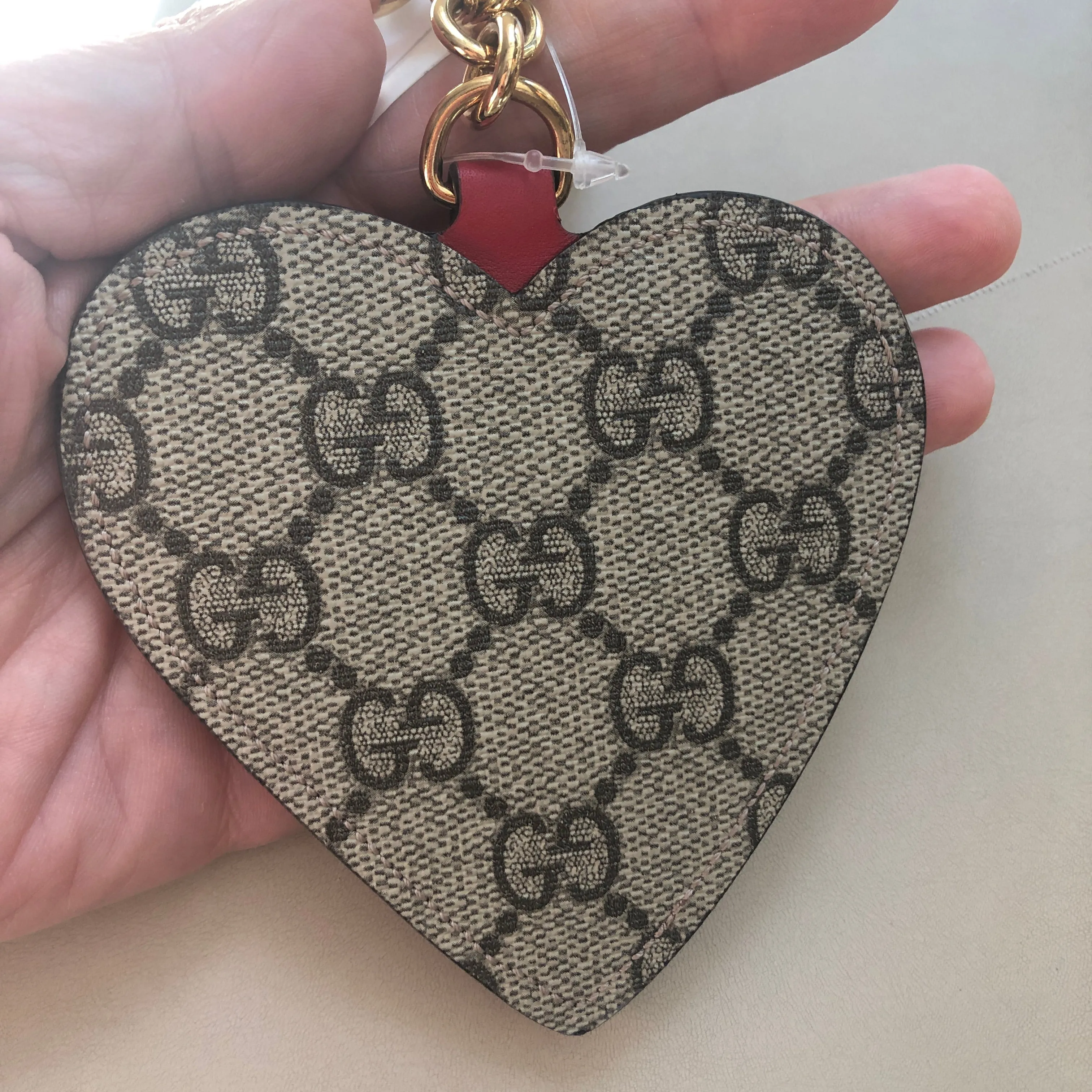 Gucci GG Supreme Embroidered Heart Keychain in Beige