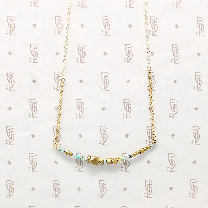 Turquoise & Brass Bead Arc Necklace by Brin